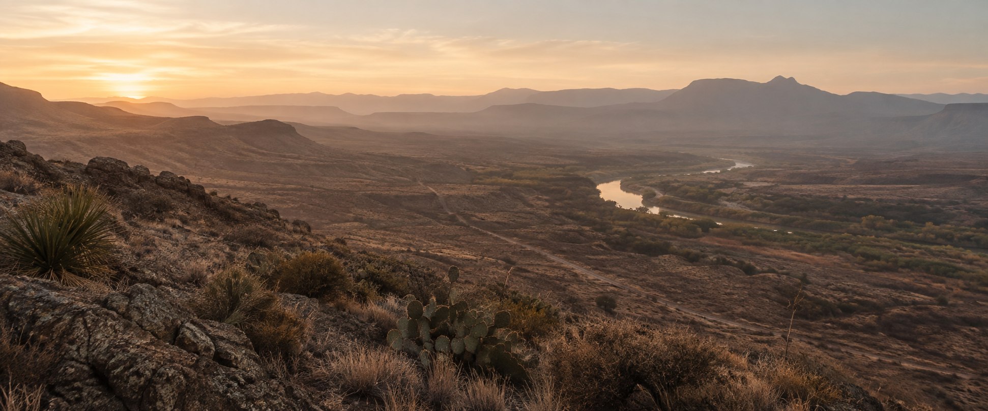 A river winding through Chihuahuan Desert terrain at first light